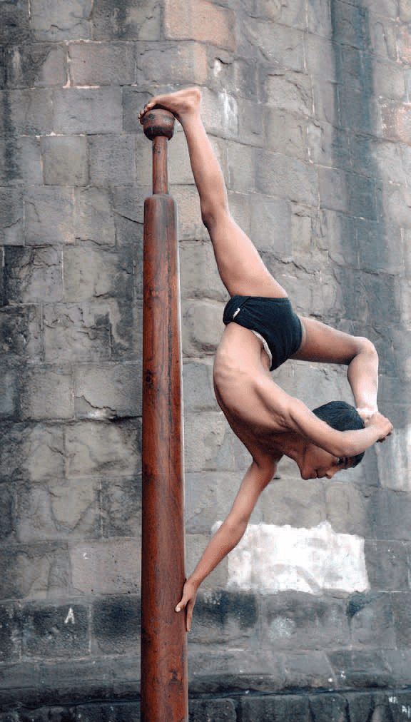 Photo Rope malkhamb performance , the ancient form of Indian Gymnastics,  India Image #10913229